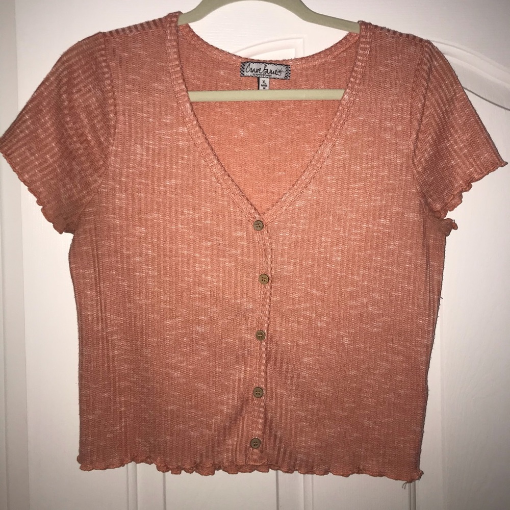 A coral cropped top